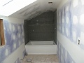 Purple walls with white spots.