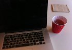 Laptop and beer in a cup. Yes.