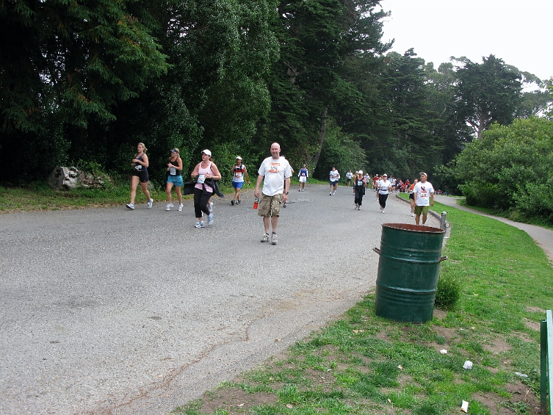 ChrisApproaching-mile17.JPG - walking off a bit of nausea at mile 17. Zoom in and look at the faces of the people around me.