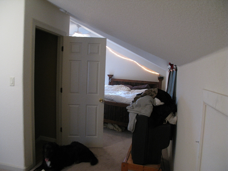 IMG_2066.JPG - Note how stairs/door force you under low part of roof when walking around.