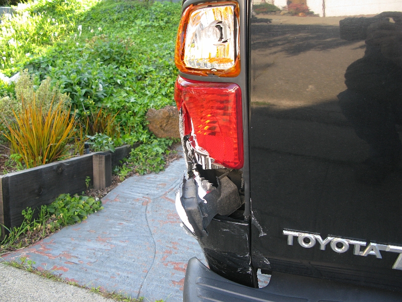 IMG_2422.JPG - Some kind of new model SUV, super clean looking, except for the peeled back front right corner. Nothing wrong with the engine though as he legged it away at 2x the speed limit.