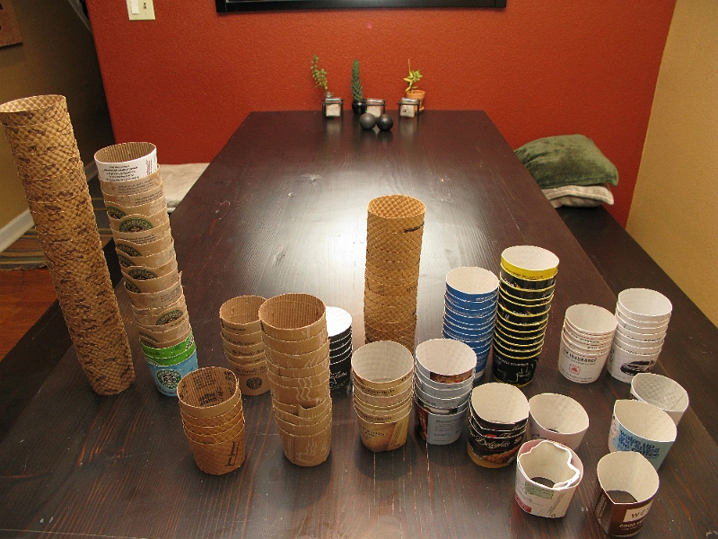 IMG_2717.JPG - All the coffee cup sleeves from 2008. Sometimes you ask yourself, how many of these things do I use? And if you are crazy, you decide to keep them all for a year to find out.
