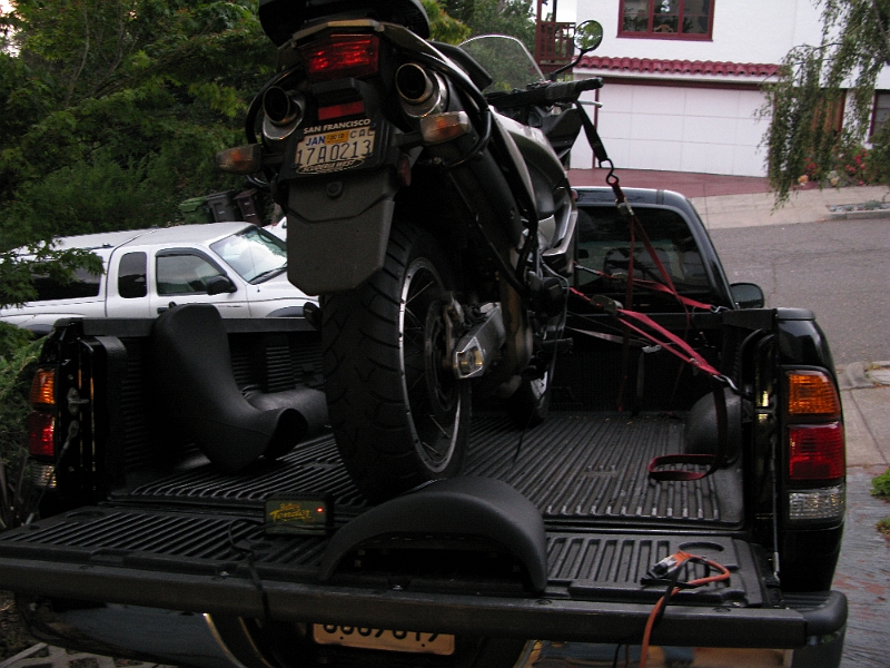 IMG_0090.JPG - Secured with extra straps on the chassis so I can loosen the bar straps. Recharging the battery too.