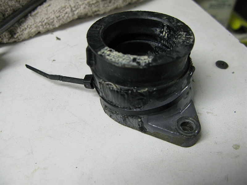 IMG_0145.JPG - Who uses a zip tie over wet JB Weld? Why I don't just trash this I have no idea.