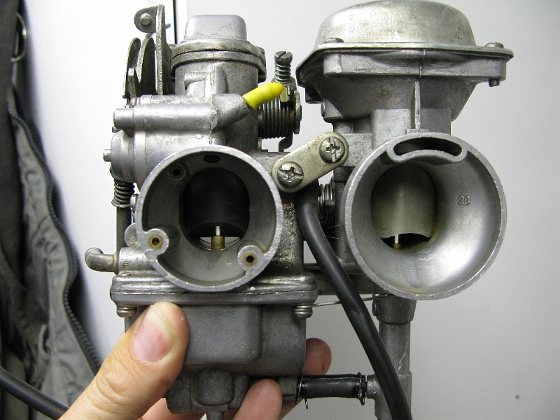 IMG_0148.JPG - One flatslide, one CV. Could not get these things to work. All cleaned up, with a new diaphragm in the CV, still couldn't get the bike to run.