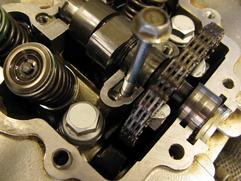 IMG_0213.JPG - We are back in business. The bolt hole on the far left is not looking like it is going to take much to strip it either. Will have to be super careful with the torque wrench when reassembling all this. Now I just need to pick up some gasket goo for the seal between the head and the cover, and then for the delivery of the new bolt "gaskets". I am not a fan of whoever thought up metal washers with a half mm thick rubberized coating.