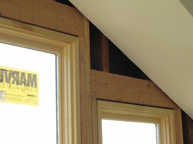 IMG_0398.JPG - Headers fit under the soffit without much hassle. Convenient.