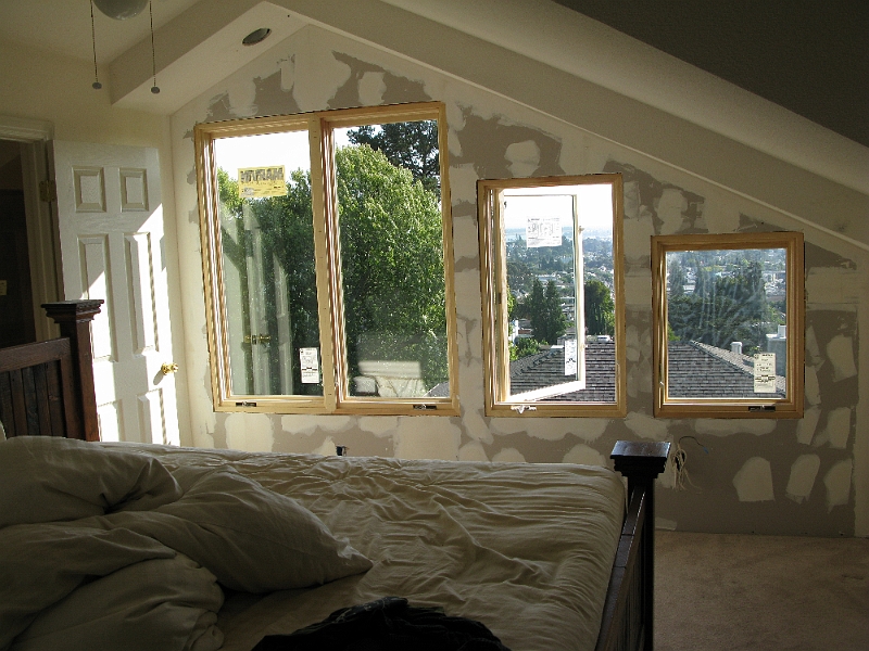 IMG_0409.JPG - Rough electrical and sheetrock done. I even figured out how to unlatch the lock on the window so I could crank it open and get some air.