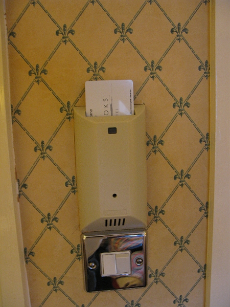 IMG_0963.JPG - Interesting gizmo. You get the lights in the room set the way you want, some on, some off, and then when you leave you pull the room key and they all go out, and when you return pop it in and your preference is restored. Saves the hotel from paying for juice in an empty room too.