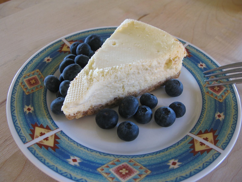 0725.jpg - Closer. A little better. This angle doesn't overemphasize the funky texture pressed into the cheesecake by the freezer bag. Berries were'nt ripe enough.