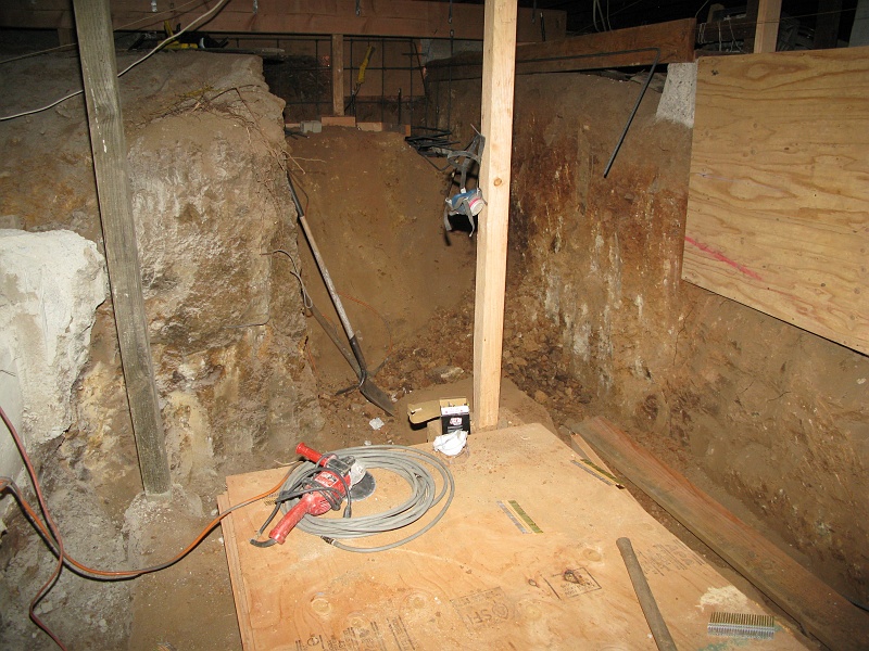 IMG_1252.JPG - Way below the original level in some places. More than I had imagined. Ramp area in the back is where the stairs will come down.