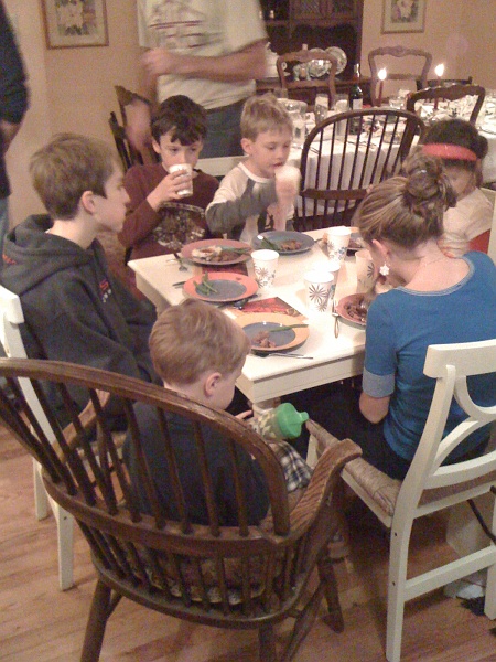 IMG_0179.JPG - The kids table, about 30 seconds before Madison makes a run for the restroom to get sick.