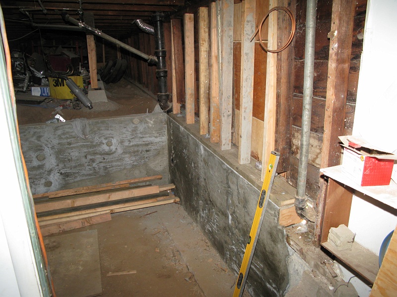IMG_1510.JPG - Forms pulled out. Looks OK. Some new framing going in already.