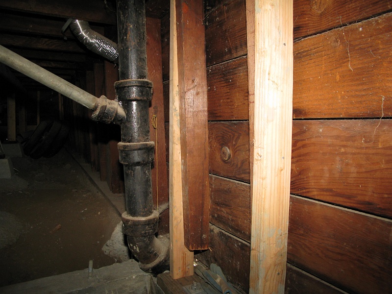 IMG_1511.JPG - New lumber is level. I don't recall the orginal wall seeming that out of level, but there it is.
