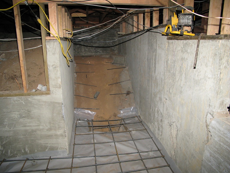 IMG_1530.JPG - Not sure if the stairs will go at the same time as the slab or not.