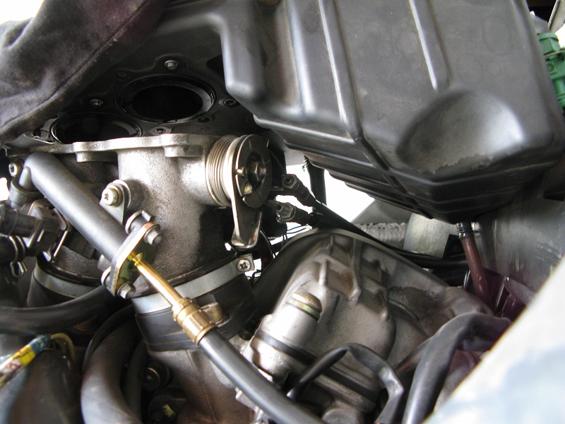 IMG_1726.JPG - Nothing loose on this end. Adjuster on the pull cable is all the way tight already. That must mean...