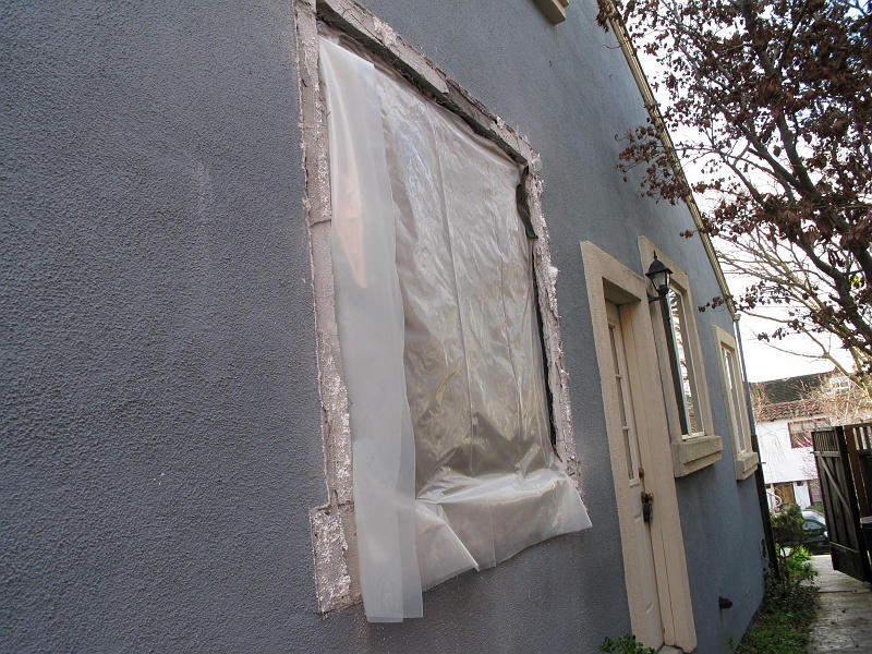 IMG_1780.JPG - Plastic sheeting over the plywood was a good move given all the rain of late.