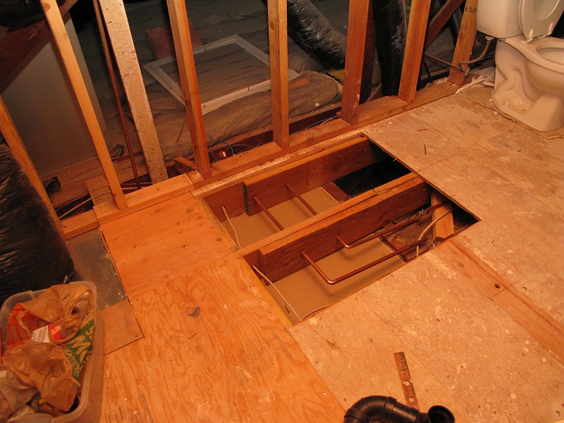 IMG_1902.JPG - Cleaning up the old plumbing.