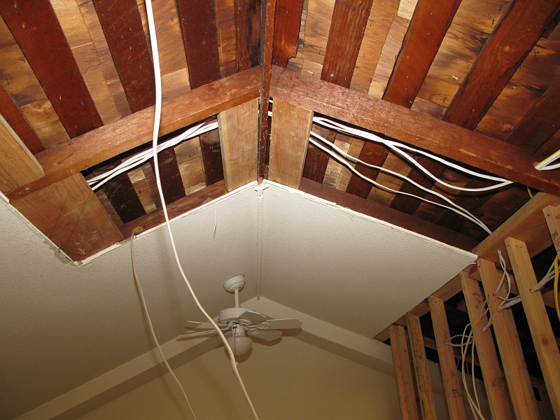 IMG_1952.JPG - Watch where you bang those roofing nails. Or put that ridge vent...