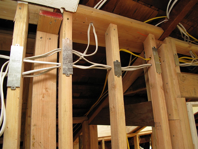 IMG_2009.JPG - Protect those wires from nailing and drilling.