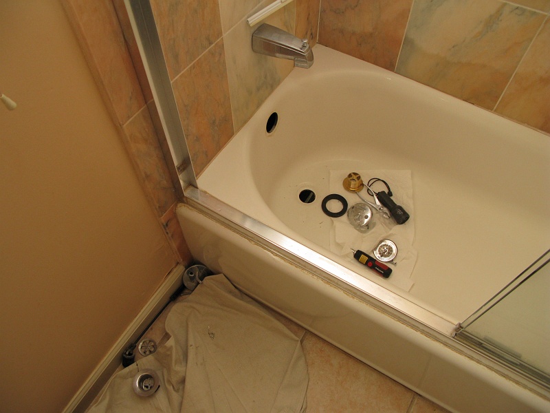 IMG_2013.JPG - Having to replace the under-tub plumbing now that there will be a finished ceiling beneath it.