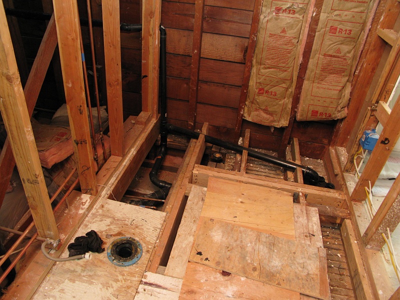 IMG_2091.JPG - Plumbing that got flagged in the inspection. Tub can't drain into the vent from the downstairs bath. Even though the shower that was there before did exactly that.