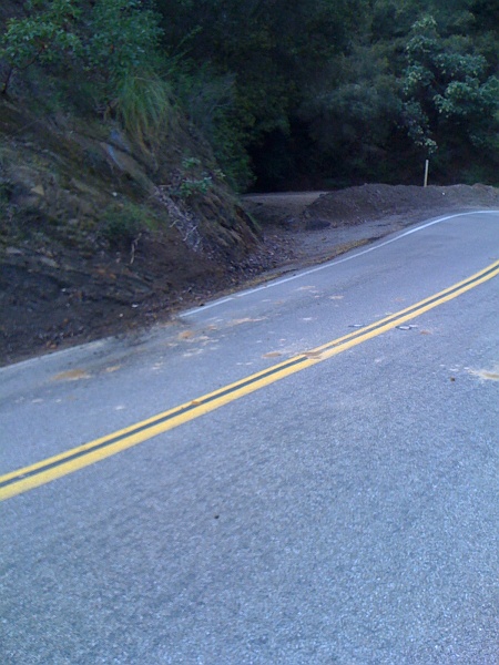 IMG_0229.JPG - WR250 dude came from the right in the far lane, hit that dirt embankment and wound up on the center line.