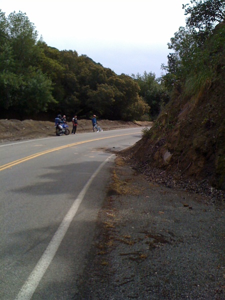 IMG_0230.JPG - Note the skid mark looking line on the ground. He probably locked up the back brake. Heck of a spill. Obvious concussion symptoms. Rode away while we tried to talk him out of it.