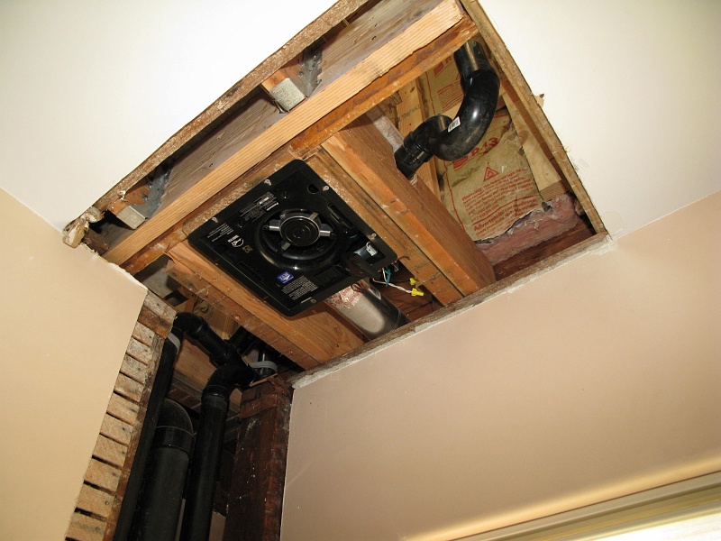 IMG_2136.JPG - New fan for the downstairs bath while we are at it. Had to cut out that ceiling anyway due to the water damage.