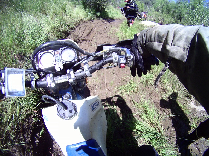 PICT0656.JPG - After carefully kicking the engine through one revolution and determining that it is not hydro-locked, we begin the process of clearing out the cylinder for a restart. Grab a big handful of throttle, like so.
