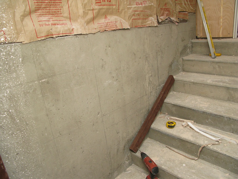 IMG_2529.JPG - Lines on the wall roughly show where vertical supports will go, and where shelves will be.