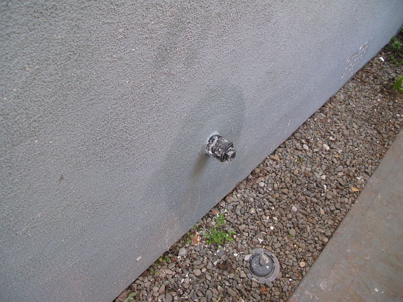 IMG_2563.JPG - Nice thing to do without being asked. Touch up the wall where a plumber cut a rough hole for a cleanout a few years ago.