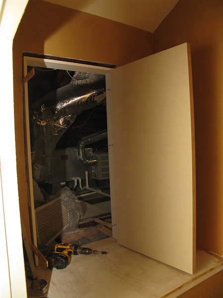 IMG_2654.JPG - Proper access doors being hung. No more wallboard panels screwed into rough openings.
