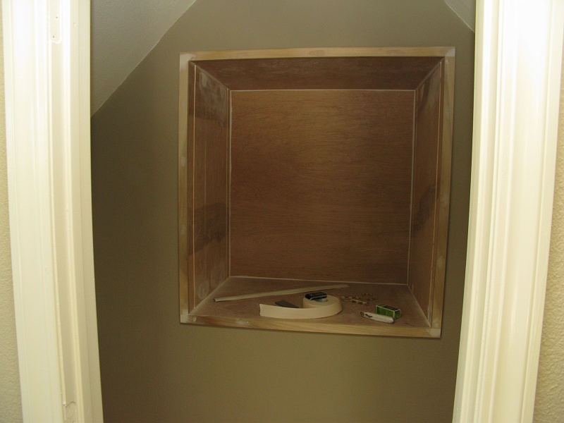 IMG_2657.JPG - Trim is up on the storage niche.