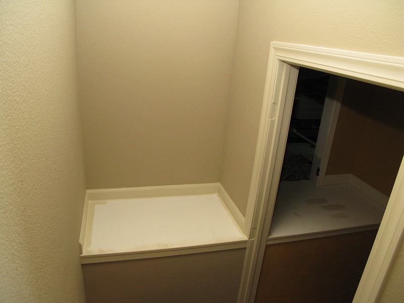 IMG_2681.JPG - Primed and some trim done. They weren't sure at this point if the flat boards would be trim color as well. (They are)