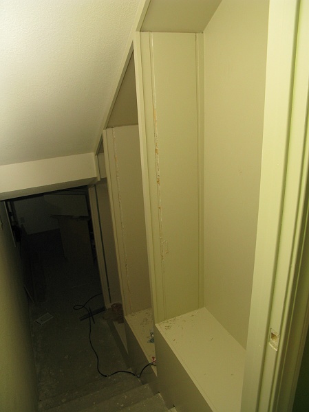 IMG_2695.JPG - They are installing the adjustable shelf tracks.