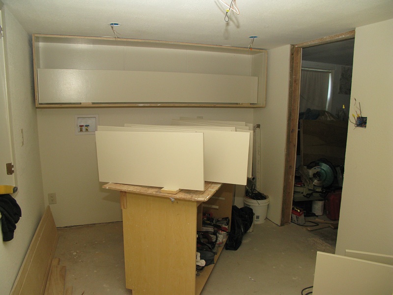 IMG_2697.JPG - Two coats of paint on the shelves.