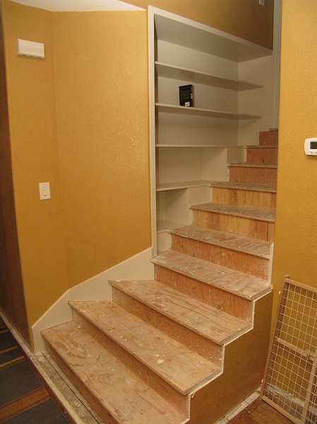 IMG_2784.JPG - Trim bits around the edge of the stairs are labor intensive.