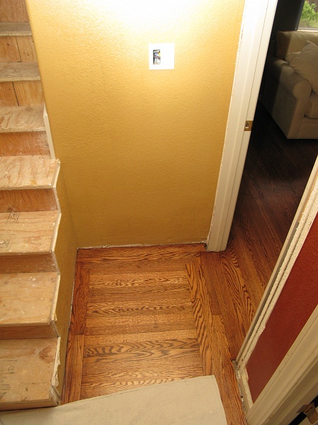 IMG_2884.JPG - There is 34" from wall on right to drywall on left at base of stairs. Door to guest room is nominal 30" (actually 29.5)