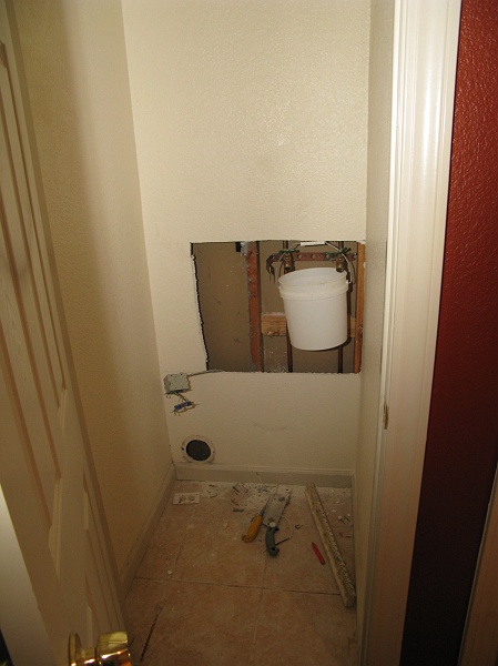 IMG_3063.JPG - All this stuff has to go! Closet doesn't need plumbing hookups.