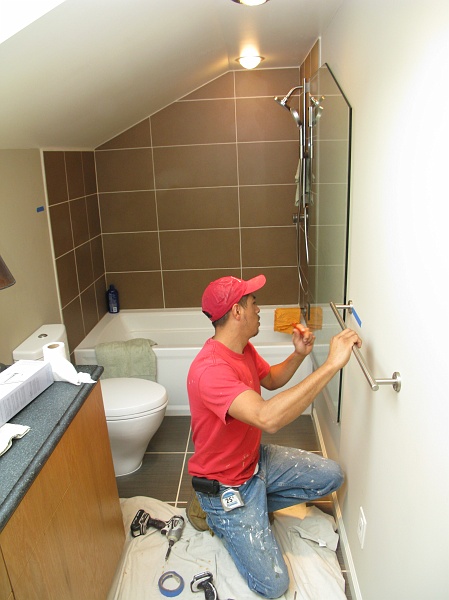 IMG_3145.JPG - Bath towel bars being installed as we went to press.