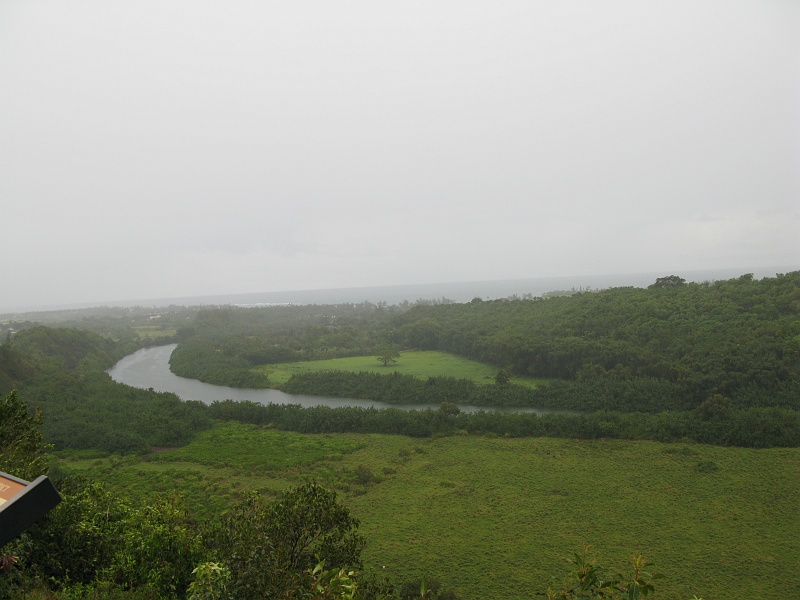 IMG_3470.JPG - The coastal town where the river lets out is sort of obscured here. Raining pretty good at this point.