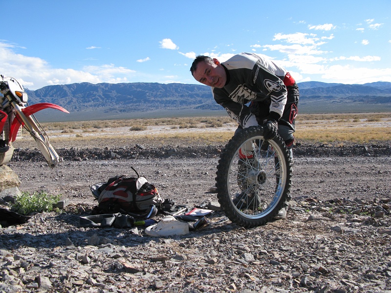 IMG_3628.JPG - Re-inflating the tire.