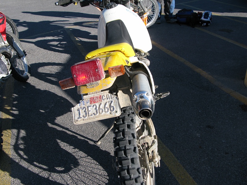 IMG_3646.JPG - The muffler has been kludged back on to the bike. We'll see how it holds up.