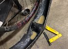 IMG 2686  Old tire has to go. Man this thing was tight on the rim! Glad I never had to try and put a tube in it on the trail.