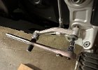 IMG 8159  We replace the steel shifter pivot with a titanium one. And we keep the steel one as a spare, since the brake pedal uses the same part. Note the red loctite as usual.