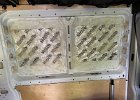 IMG 2830  Panel and sheep's wool removed. Looks like spray adhesive was used to hold it in place. Hoping that will not be a problem. Sent this picture to the shop owner and he said the Kilmat has to go. Foo.
