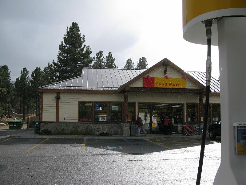 IMG_1598.JPG - Check the individual drops of rain in the air. Easiest to see just below where it says "food mart."