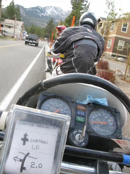 IMG_1605.JPG - Commiserating with a few other dudes who also got lost because the rollchart was mismarked. Those should say .1 and .2, not 1.0 and 2.0. If we'd reset our tripmeters at the right place this would have been more readily evident.